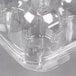 a clear plastic container with a hole