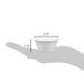 A hand holding a white Carlisle melamine ramekin with a shadow.