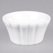 A white bowl with a ruffled edge.