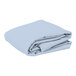 A stack of folded light blue rectangular Intedge table covers.