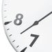 A Taylor large dial patio clock with numbers on it.