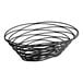 An American Metalcraft black wire oval birdnest basket with a spiral design.