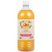 A close up of a bottle of Woeber's Organic Apple Cider Vinegar with a label.