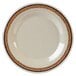 A white plate with a brown border.