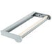 A white roll of paper on a grey metal Bulman paper cutter with a wooden handle.