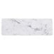 An Elite Global Solutions rectangular serving board with a marbled white surface.