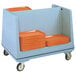 a stack of orange trays