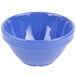 A peacock blue melamine bowl with a white background.