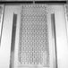 An Avantco rear shelf support panel with holes in a white metal surface.