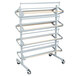 A metal Bulman horizontal paper rack with wooden shelves.