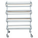 A white metal Bulman paper rack with four shelves.