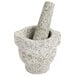 A Fox Run stone mortar and pestle.