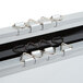 A Chef Master reversible black and white marker board with metal clips.