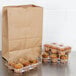 a close-up of muffins in plastic containers