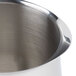 a close up of a silver pot