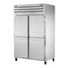 A white True Spec Series refrigerator with silver half doors.