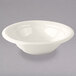 A Tuxton eggshell white china pasta bowl.