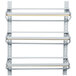 A white metal Bulman paper roll rack with three horizontal shelves.