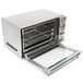 a silver toaster oven with a glass door