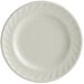 A Tuxton Meridian ivory china plate with a swirl rim.