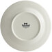 A white Tuxton china plate with embossed swirl rim and black text that says "Meridian"
