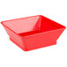 a red plastic container with a white background