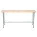 An Advance Tabco wood top work table with a galvanized metal base.