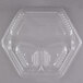 A clear hexagonal plastic lid for a Genpak foam container.