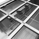 A close-up of the cooling system in a Turbo Air refrigerated buffet display table.