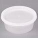 A Pactiv translucent round deli container with a lid.