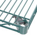 A Metroseal green metal wire shelf on a Metro rack.