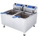 A Globe dual tank electric countertop fryer with blue handles.