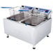 A Globe dual tank electric countertop fryer with two baskets.