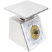 An Edlund Four Star Series portion scale with a white cover and a yellow dial.