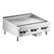 A stainless steel 36-inch natural gas countertop griddle with four control knobs and thermostatic controls.