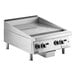 A stainless steel 24-inch natural gas countertop griddle with thermostatic controls and three control knobs.