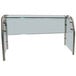 An Advance Tabco self service food shield with a metal frame on a glass table with metal legs.