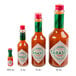 A group of TABASCO hot sauce bottles.