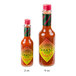A close up of a TABASCO Habanero Hot Sauce bottle.