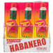 A close-up of a TABASCO® Habanero Hot Sauce bottle in a box.