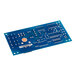 A blue Manitowoc Ice control board with many small silver objects.