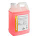 A large plastic container of pink Noble Chemical All Surf All Purpose Concentrated Liquid Cleaner.