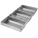 a silver tray with four compartments