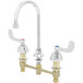 A chrome T&S deck mount medical faucet with two wrist action handles.