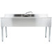 An Eagle Group stainless steel underbar sink with two drainboards and a faucet.
