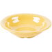 A close up of a GET Tropical Yellow Melamine Bowl.