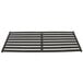 A black metal broiler rack with four bars.