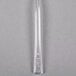 A clear plastic tasting fork with a handle.