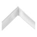A close-up of a white corner on a white background.
