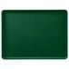 A green Cambro dietary tray with a white border.